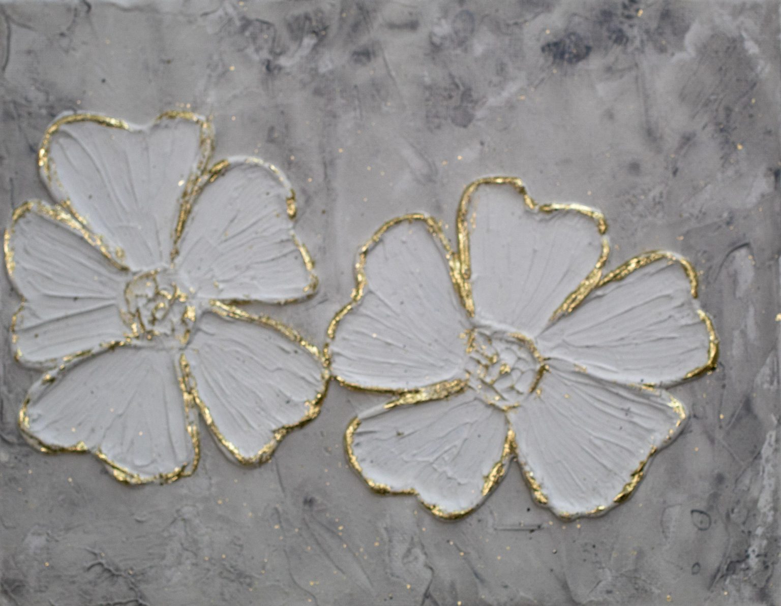 Textured floral painting of two white flowers with gold edges on gray