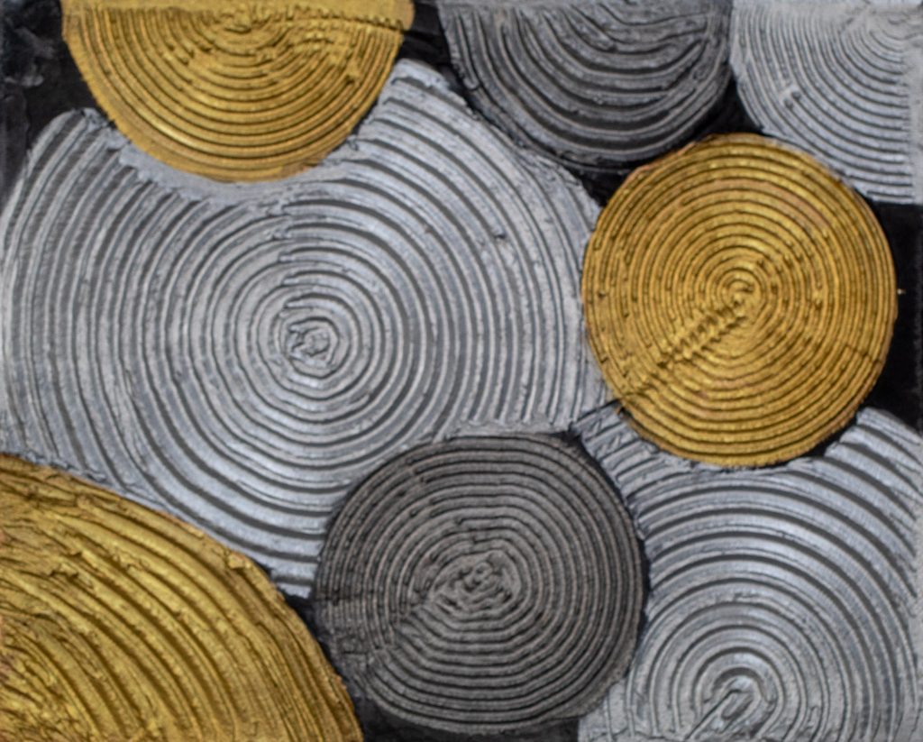Abstract acrylic painting of silver and gold textured spirals on a near-black background